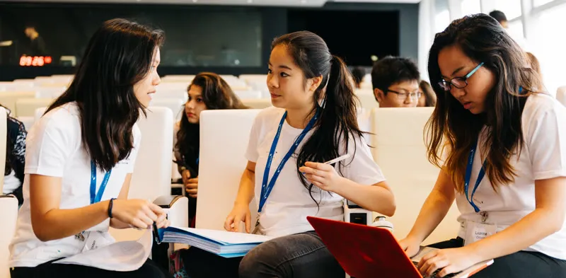 YFS students working on their startup project during a bootcamp